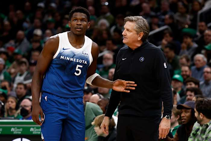 Jan 10, 2024; Boston, Massachusetts, USA; Minnesota Timberwolves head coach Chris Finch talks with guard Anthony Edwards (5) during the second quarter against the Boston Celtics at TD Garden.